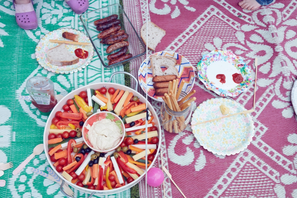 If you are throwing a garden summer party then create large platters for the kids picnic lunch and arrange on rugs in the garden