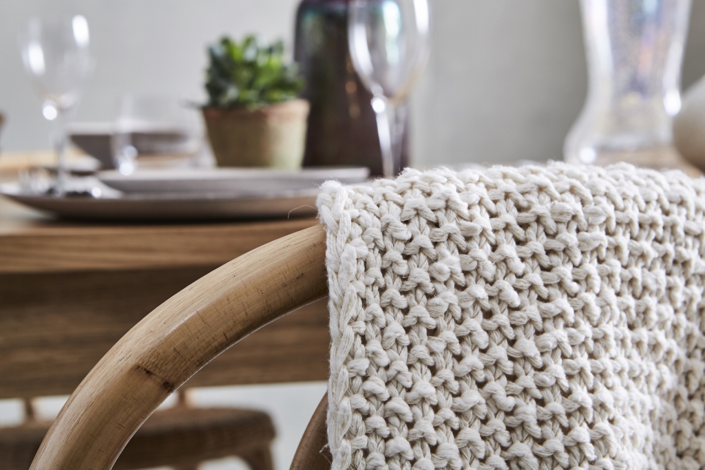 soft cotton chunky knit throw gives a realxed vibe to a summer setting