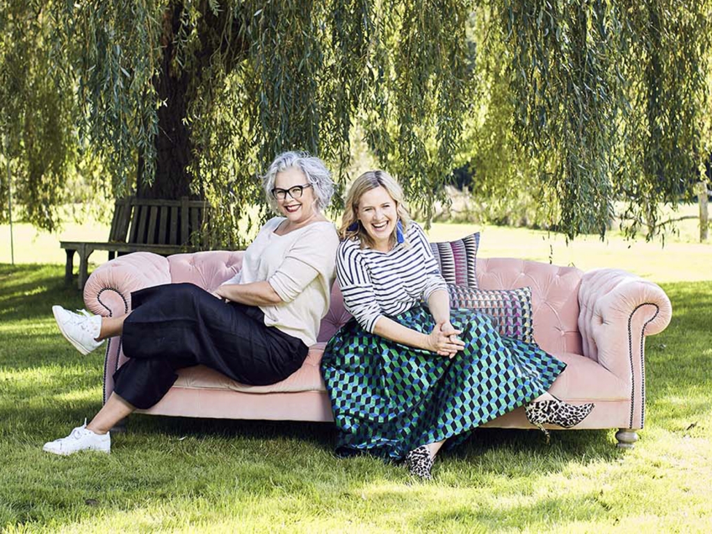 Interior designer Sophie Robinson and journalist Kate Watson-Smyth The Great Indoors podcast, pink velvet sofa in garden