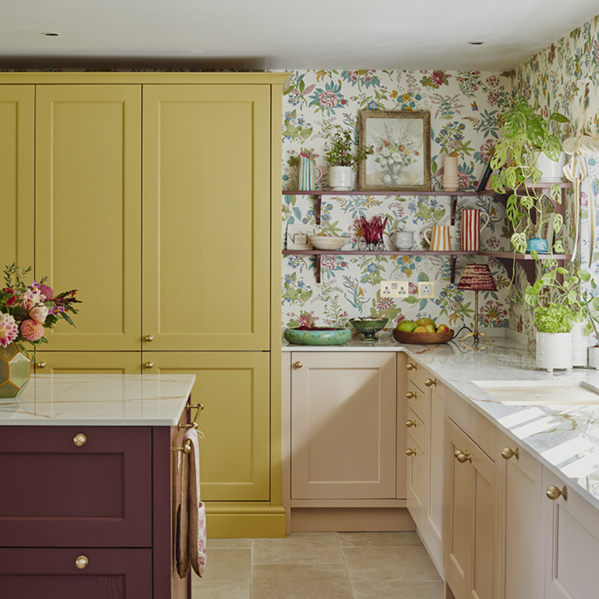 Sophie Robinson's Kitchen - yellow, pale pink and burgundy cabinetry