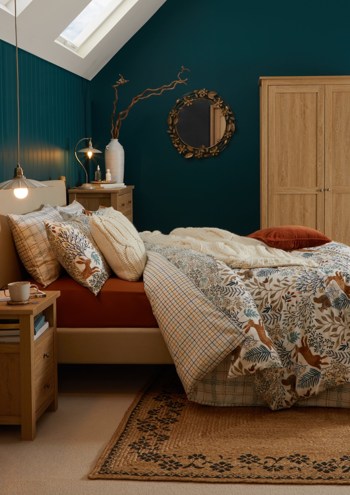 Autumnal layered Bedding in teal blue bedroom