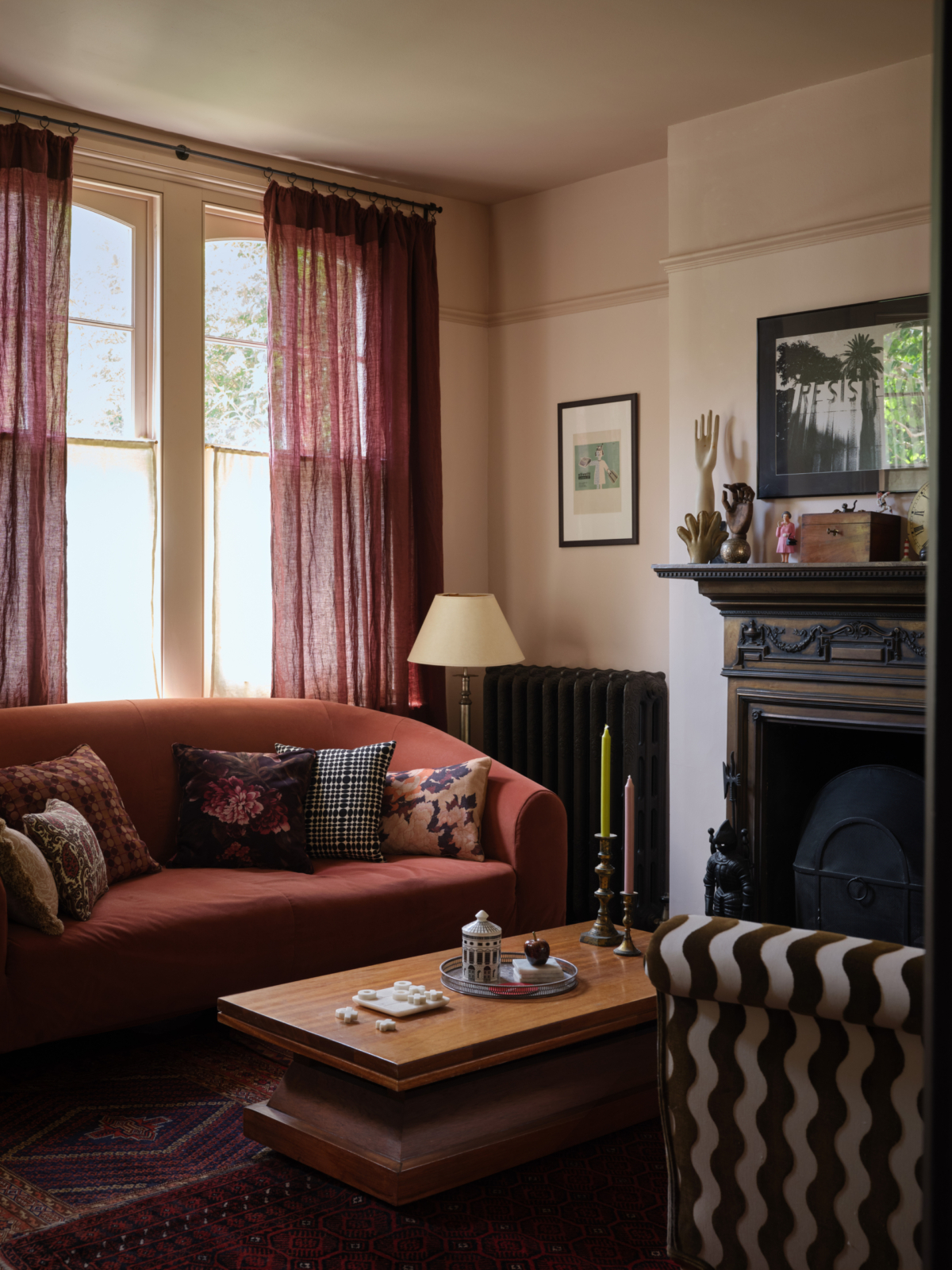 Autumnal tones in Kate Watson Smyth's Living Room. Red sofa and curtains